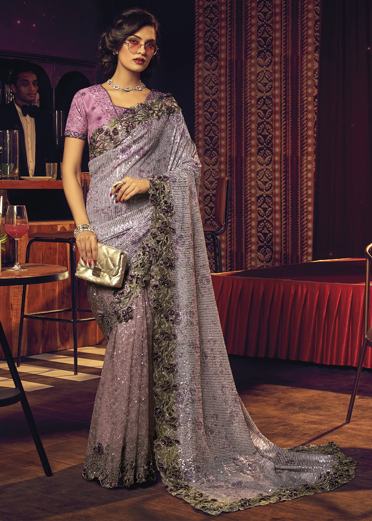 https://www.urbanwomania.com/wp-content/uploads/2023/11/Purple-Designer-Saree-with-Heavy-Work.webp